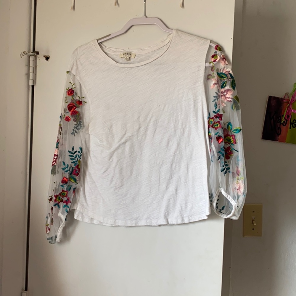 White shirt with sheer sleeves with floral threading